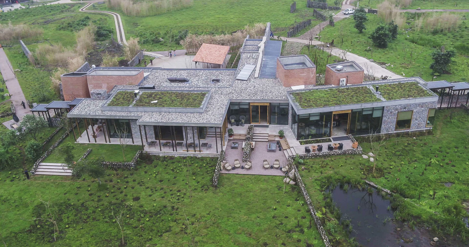 Tourism + Culture, Singita Kwitonda Lodge, aerial, landscape, green roof, gardens